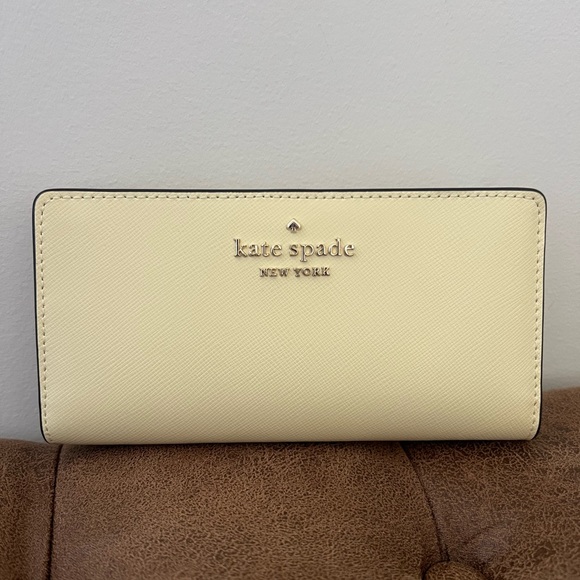 kate spade Handbags - Kate Spade Staci Saffiano in Lemon Fond Bifold Wallet